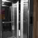 Asmon Burj Novin, design and installation of an escalator lift in Tehran